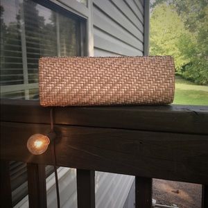 Tan wicker clutch